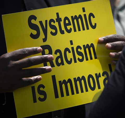 A protester is seen near the Capitol in Washington May 21, 2018, during an anti-racism demonstration. (CNS/Tyler Orsburn) A protester is seen near the Capitol in Washington May 21, 2018, during an anti-racism demonstration. (CNS/Tyler Orsburn)