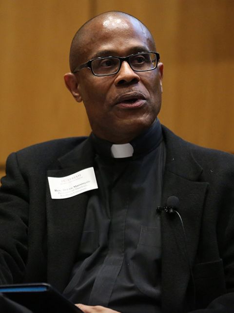 Fr. Bryan Massingale, a theology professor at Fordham University in New York City, is seen here in a 2017 panel discussion in New York. (CNS/Fordham University/Bruce Gilbert)