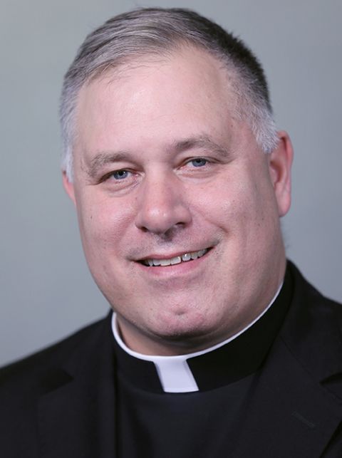 Msgr. Jeffrey Burrill, a priest of the Diocese of La Crosse, Wisconsin, is seen in this 2018 file photo. (CNS/Bob Roller)