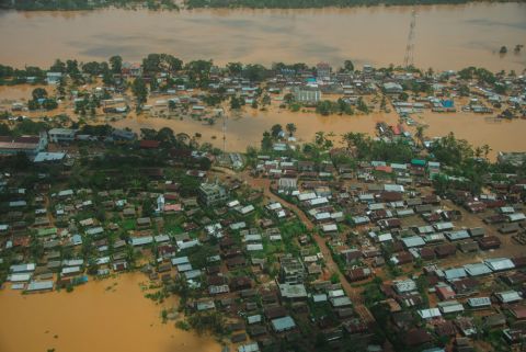 Flooded homes in Vohipeno, Madagascar, are pictured in an aerial view Feb. 7, 2022, in the aftermath of Cyclone Batsirai. (CNS/CRS/Miguel Rasolofo)