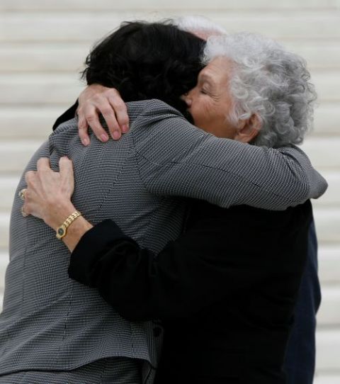 U.S. Supreme Court Justice Sonia Sotomayor hugs her mother, Celina Sotomayor, after her investiture ceremony at the Supreme Court in Washington, D.C., Sept. 8, 2009. (CNS/Bob Roller)