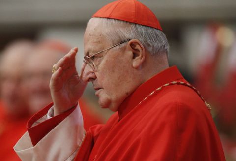 Cardinal Angelo Sodano, then dean of the College of Cardinals, makes the sign of the cross during a Mass celebrated by Pope Benedict XVI in St. Peter's Basilica at the Vatican, Nov. 21, 2010. (CNS/Paul Haring)