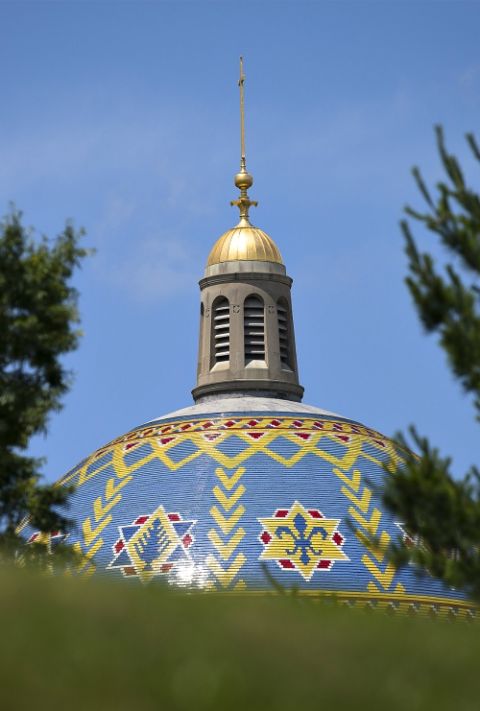 The dome of the Basilica of the National Shrine of the Immaculate Conception is seen June 6, 2019, near the grounds of the Catholic University of America in Washington. (CNS/Tyler Orsburn)