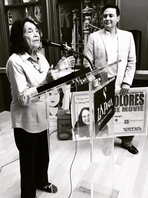 David Damian Figueroa David Damian Figueroa watches as Dolores Huerta addresses the crowd at the pre-reception for the premiere of the documentary "Dolores." (Courtesy of David Damian Figueroa)