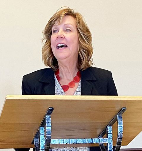 Delia Meier talks about Iowa 80 Truckstop's commitment to sustainable energy during a dialogue with Iowa business leaders at St. Patrick Catholic Church in Iowa City Aug. 24. (CNS/The Catholic Messenger/Barb Arland-Fye)
