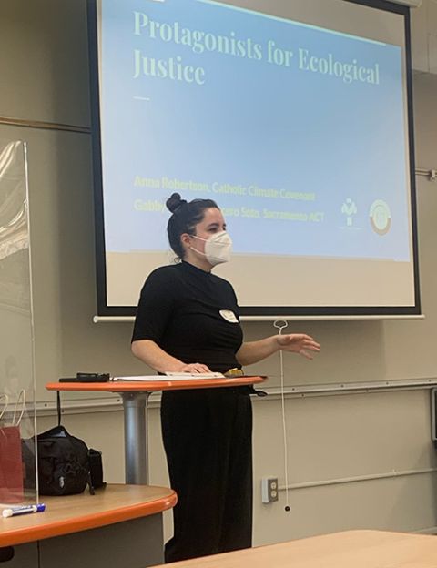 Anna Robertson gives a presentation on climate justice to high school students at Jesuit High School in Sacramento, California. (Courtesy of Anna Robertson)