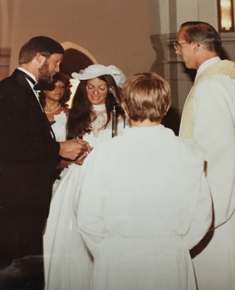 Jesiut Fr. Ray Schroth, right, presides over the nuptial mass for Loretta Tofani and John White at the Annunciation Church in Crestwood, New York, in 1983. (Courtesy of Loretta Tofani) Jesiut Fr. Ray Schroth, right, presides over the nuptial mass for Loretta Tofani and John White at the Annunciation Church in Crestwood, New York, in 1983. (Courtesy of Loretta Tofani)