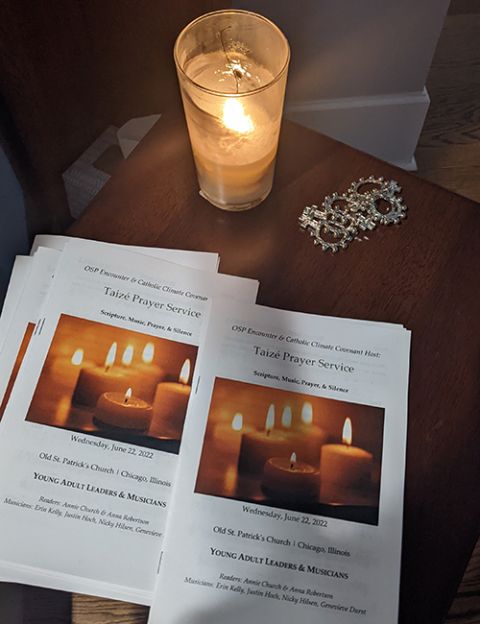 Programs set out for a collaborative young adult Taizé and happy hour event hosted in June 2022 by Catholic Climate Covenant and Old St. Patrick's Catholic Church in Chicago. (Courtesy of Anna Robertson) Programs set out for a collaborative young adult Taizé and happy hour event hosted in June 2022 by Catholic Climate Covenant and Old St. Patrick's Catholic Church in Chicago. (Courtesy of Anna Robertson)