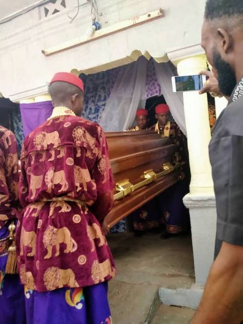 Pallbearers carry the coffin of John Anyibgo during his funeral. (Provided photo)