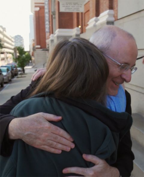Jesuit Fr. James Martin embraces Christine Leinonen, who lost her son Drew in the 2016 mass shooting at the Pulse nightclub in Orlando, Florida in a still from the 2021 film "Building a Bridge." (NCR screenshot/Obscured Pictures)