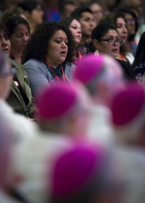 Women delegates are seen near prelates during the Mass for the Blessed Virgin Mary Sept. 22 during the Fifth National Encuentro in Grapevine, Texas. (CNS/Tyler Orsburn)