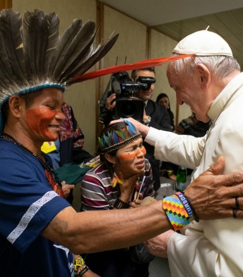 Pope Francis meets indigenous people from the Amazonian region during the Synod of Bishops for the Amazon at the Vatican Oct. 17, 2019. (CNS/Vatican Media)