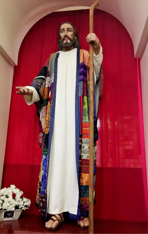A quilt robe on St. Mark's statue of the Missionary Jesus is made up of pieces of fabric from multiple countries. (NCR photo/Soli Salgado)