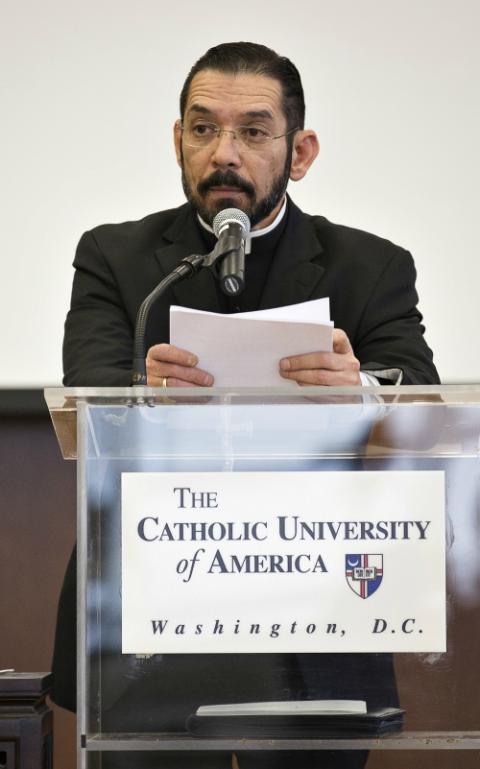 Bishop Daniel Flores of Brownsville, Texas, delivers a lecture on immigration on the campus of the Catholic University of America in Washington in 2015. (CNS/Tyler Orsburn)