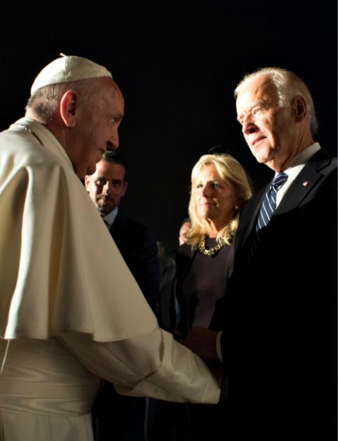 Pope Francis greets Vice President Joe Biden and his wife, Jill, during a farewell ceremony at Philadelphia International Airport Sept. 27, 2015. (CNS/L'Osservatore Romano, handout)