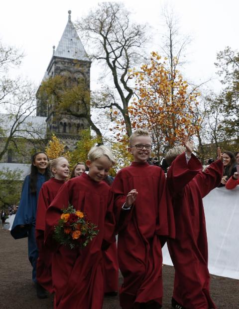 Children walk outside the Lutheran cathedral as they prepare to meet Pope Francis in Lund, Sweden, Oct. 31, 2016. (CNS/Paul Haring)