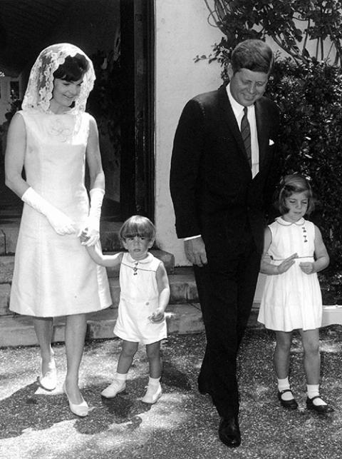 U.S. President John F. Kennedy, his wife, Jacqueline, and their children, Caroline and John Jr., are seen on Easter Sunday in 1963. (CNS/Reuters) U.S. President John F. Kennedy, his wife, Jacqueline, and their children, Caroline and John Jr., are seen on Easter Sunday in 1963. (CNS/Reuters)