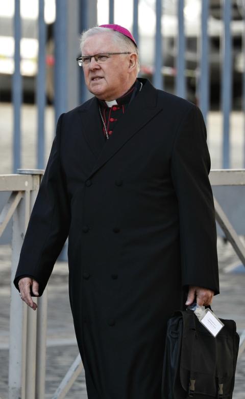 Archbishop Mark Coleridge of Brisbane, Australia, leaves the morning session of the Vatican meeting on the protection of minors Feb. 22. (CNS/Paul Haring) Archbishop Mark Coleridge of Brisbane, Australia, leaves the morning session of the Vatican meeting on the protection of minors Feb. 22. (CNS/Paul Haring)
