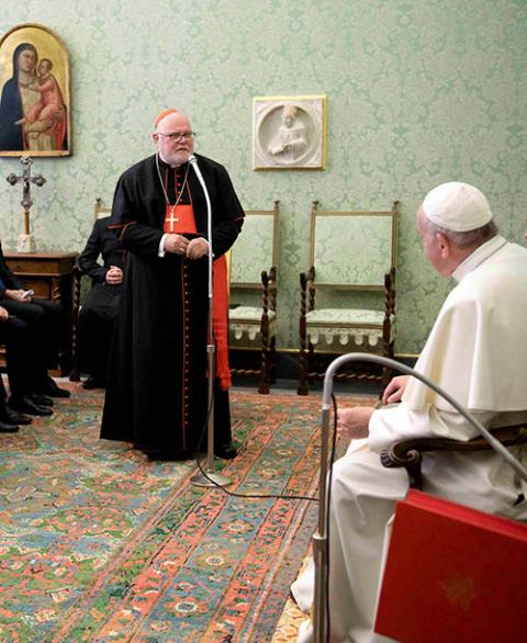 Cardinal Reinhard Marx of Munich and Freising addresses Pope Francis during an audience in the Apostolic Palace at the Vatican April 4, 2019. (CNS/Vatican Media)