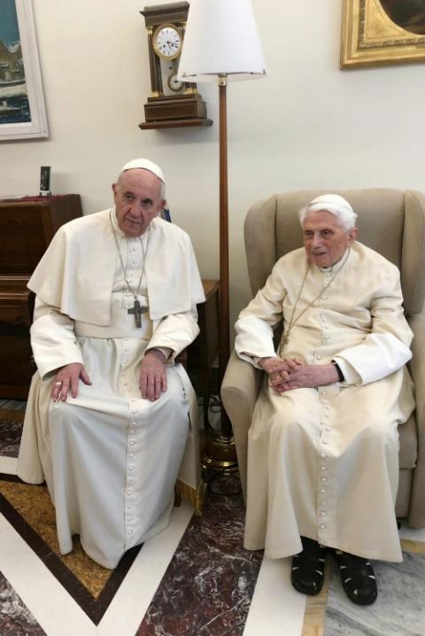 Pope Francis meets with retired Pope Benedict XVI at the Vatican April 15. (CNS/Vatican Media via Reuters)