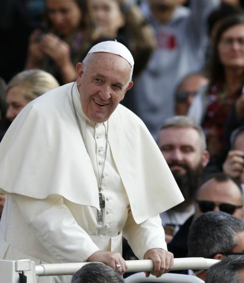 Pope Francis greets the crowd during his general audience in St. Peter's Square at the Vatican Nov. 6. (CNS/Paul Haring)