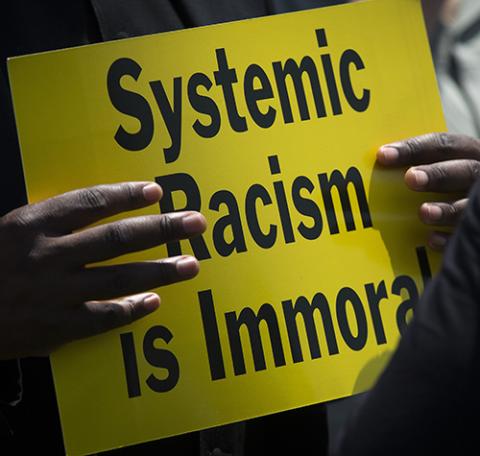 A protester is seen near the Capitol in Washington May 21, 2018, during an anti-racism demonstration. (CNS/Tyler Orsburn) A protester is seen near the Capitol in Washington May 21, 2018, during an anti-racism demonstration. (CNS/Tyler Orsburn)