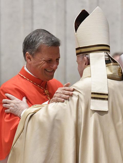 Pope Francis greets new Cardinal Mario Grech during a consistory for the creation of 13 new cardinals in St. Peter's Basilica at the Vatican Nov. 28, 2020. (CNS/Vatican Media) Pope Francis greets new Cardinal Mario Grech during a consistory for the creation of 13 new cardinals in St. Peter's Basilica at the Vatican Nov. 28, 2020. (CNS/Vatican Media)