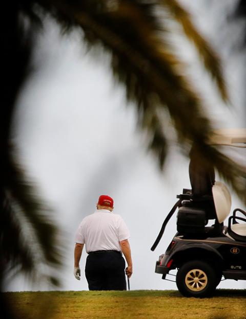 President Donald Trump plays golf at the Trump International Golf Club in West Palm Beach, Florida, Dec. 30, 2020. (CNS/Reuters/Marco Bello) President Donald Trump plays golf at the Trump International Golf Club in West Palm Beach, Florida, Dec. 30, 2020. (CNS/Reuters/Marco Bello)