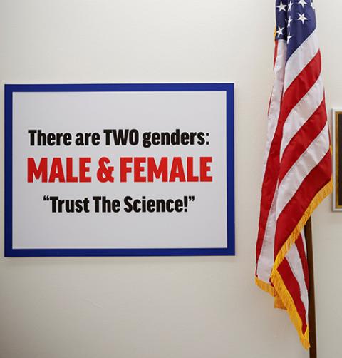 A sign hangs on the wall outside the office of Rep. Marjorie Taylor Greene, R-Georgia, in Washington Feb. 25 that reads, "There are TWO genders, MALE & FEMALE. Trust The Science!" (CNS/Reuters/Carlos Barria)