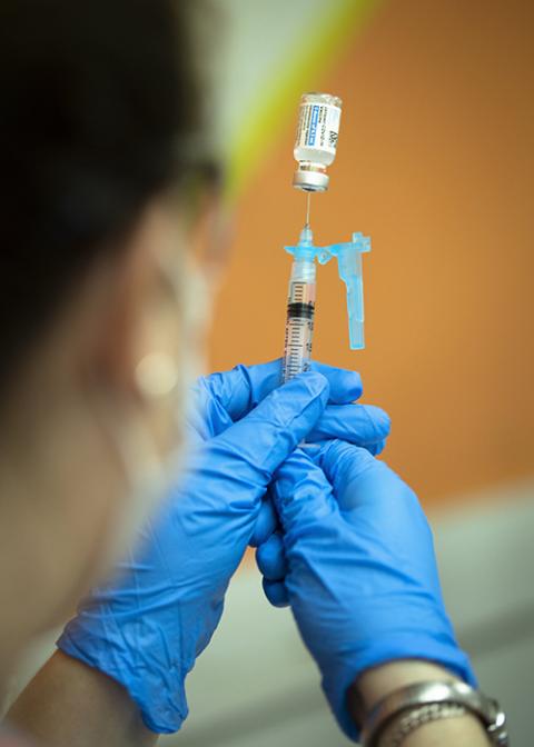 A health care worker at Catholic Charities in Washington prepares to administer the Johnson & Johnson COVID-19 vaccine May 18. (CNS/Tyler Orsburn) A health care worker at Catholic Charities in Washington prepares to administer the Johnson & Johnson COVID-19 vaccine May 18. (CNS/Tyler Orsburn)