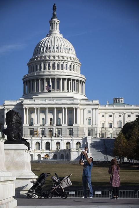 A family is seen near the U.S. Capitol in Washington Nov. 18, 2021. (CNS/Tyler Orsburn)