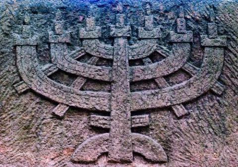 Menorah carved into stone