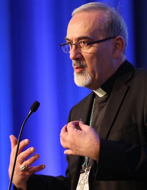 Archbishop Pierbattista Pizzaballa, Latin patriarch of Jerusalem, speaks during a Nov. 16 session of the fall general assembly of the U.S. Conference of Catholic Bishops in Baltimore. (CNS/Bob Roller)