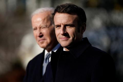U.S. President Joe Biden and French President Emmanuel Macron stand together during an official State Arrival Ceremony for Macron on the South Lawn of the White House in Washington Dec. 1. (CNS/Reuters/Elizabeth Frantz)
