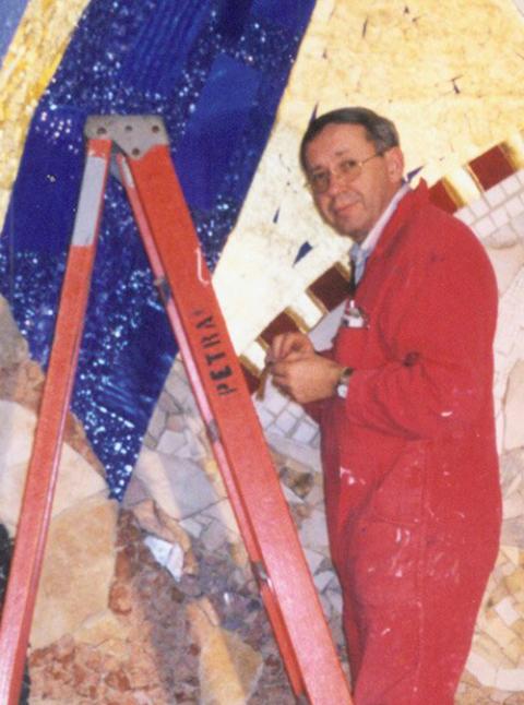Jesuit Fr. Marko Rupnik stands on a ladder in 2005 during the construction of mosaics at the Knights of Columbus international headquarters in New Haven, Connecticut. (CNS/Catholic Transcript/Mary Chalupsky)
