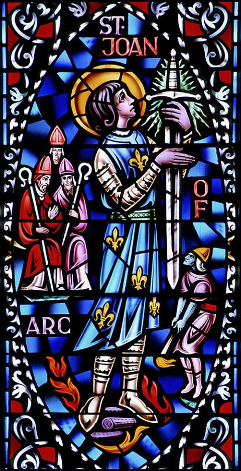 Joan of Arc is depicted in a stained-glass window at Queen of All Saints Church in Chicago. (CNS/Crosiers/Gene Plaisted)