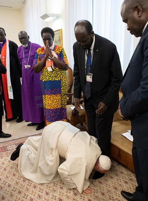 Pope Francis kisses the feet of South Sudan President Salva Kiir at the Vatican April 11, 2019. (CNS/Vatican Media via Reuters)