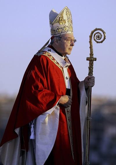 Cardinal George Pell walks onto the stage for the opening mass for World Youth Day in Sydney, Australia, July 15, 2008. Pell, who was the most senior Catholic cleric to be convicted of child sex abuse before his convictions were later overturned, has died Tuesday, Jan. 10, 2023, in Rome at age 81. 
