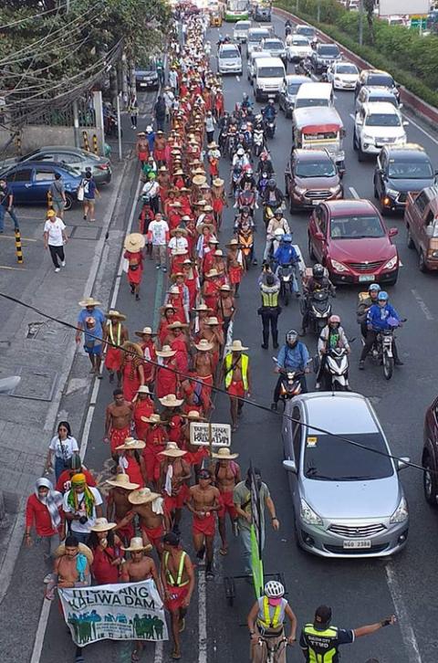 Some 300 members of Indigenous communities march toward Malacañang Palace in Manila, Philippines, to air their plea to President Ferdinand Marcos Jr. The protesters were turned away by police. (Lito Ocampo)