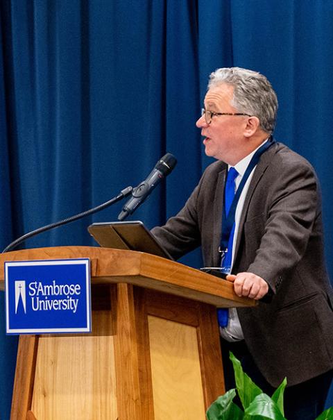 Austen Ivereigh, coauthor with Pope Francis of Let Us Dream, speaks on "Pope Francis' 'Great Reform' 10 years On" at St. Ambrose University in Davenport, Iowa, March 17. (Courtesy of St. Ambrose University)