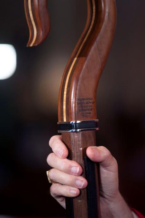 Closeup of Cardinal McElroy's hand, holding his crosier.