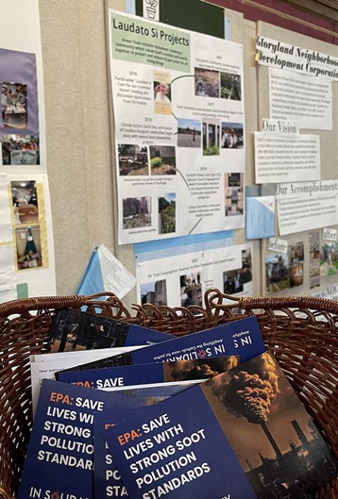 Postcards urging the EPA to lower allowable soot pollution standards are collected at the March 21 event at Gesu Catholic Church in Detroit. (Amy Ketner)