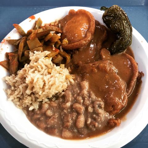 Tortitas de camarón, puffy fritters made from powdered shrimp and served in a thick red stew studded with sautéed cactus (Courtesy of Gustavo Arellano)