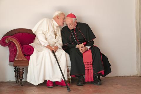 Anthony Hopkins portrays retired Pope Benedict XVI and Jonathan Pryce portrays Pope Francis in a scene from the movie "The Two Popes." (CNS/Courtesy of Netflix/Peter Mountain)