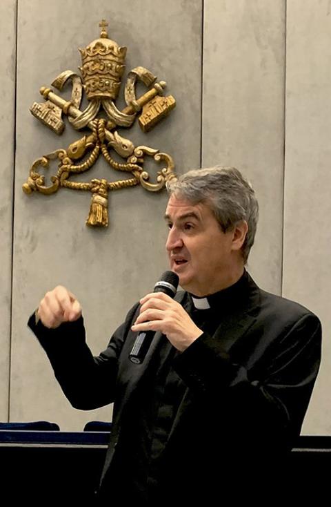 Oblate Fr. Andrew Small speaks to reporters in the Vatican press office Oct. 28, 2022, about the fall meeting of the Pontifical Commission for the Protection of Minors. (CNS/Cindy Wooden)