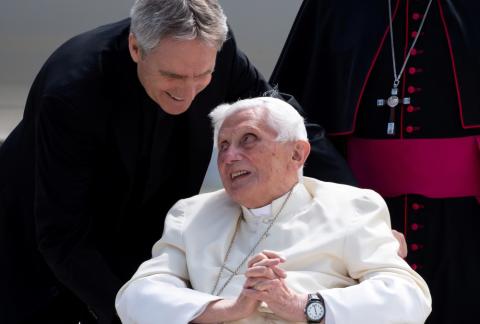 Retired Pope Benedict XVI speaks to his private secretary, Archbishop Georg Gänswein, at Germany's Munich Airport before his departure to Rome June 22, 2020. (CNS/Sven Hoppe, pool via Reuters)