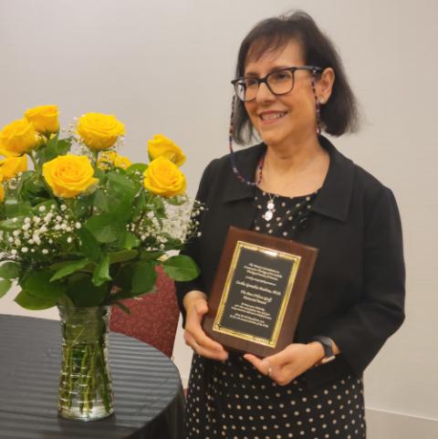 Cecilia Gonzalez-Andrieu of Loyola Marymount University in Los Angeles receives the 2023 Ann O'Hara Graff Award June 8 at the annual convention of the Catholic Theological Society of America in Milwaukee. (NCR/Heidi Schlumpf)