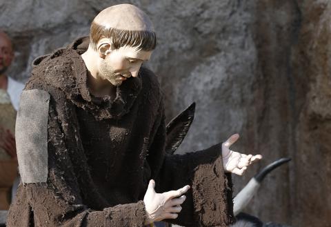 St. Francis of Assisi is depicted in a Nativity scene in St. Peter's Square Dec. 14 at the Vatican. (CNS/Justin McLellan)