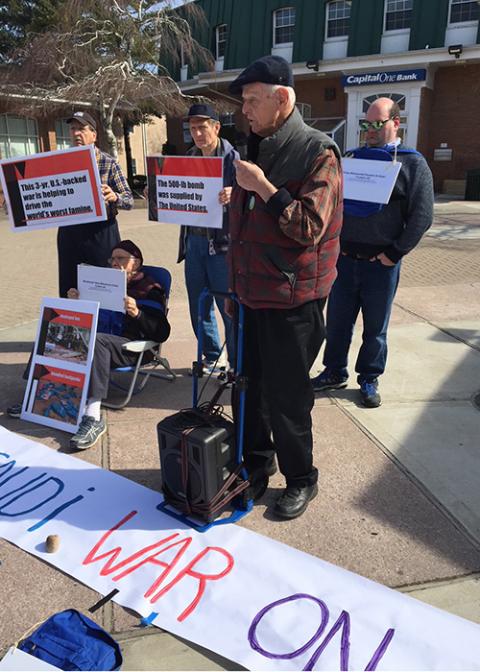 Bill McNulty speaks at a protest at a U.S. Army recruiting center in Patchogue, New York, to illustrate the alleged U.S. role in an August 2018 air assault on a Yemeni school bus. (Courtesy of Myrna Gordon)