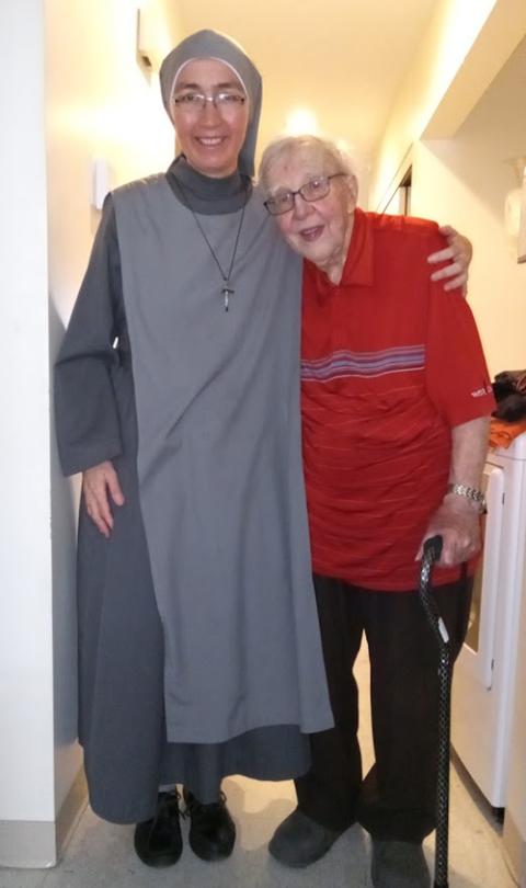 Mater Dei Sr. Natalia Vazquez helps Fr. Gérald Quintal move from his apartment to the Angus residence in Montreal. (Courtesy of Natalia Vazquez)